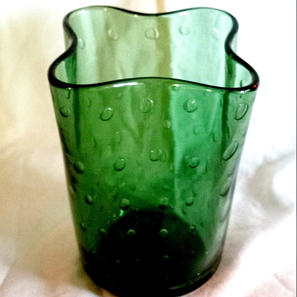 Hand blown green glass with bubbles all through the 10 oz cup